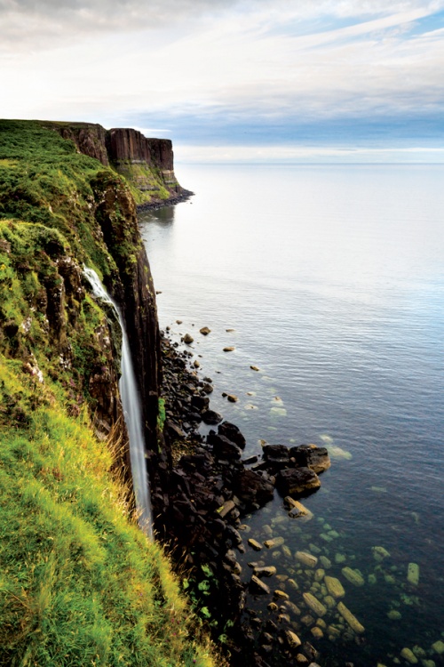 The north cliffs of Skye hide the Mealt Waterfall, with the majestic Kilt Rock in the background over the Sound of Raasay. Photo by Visit Scotland